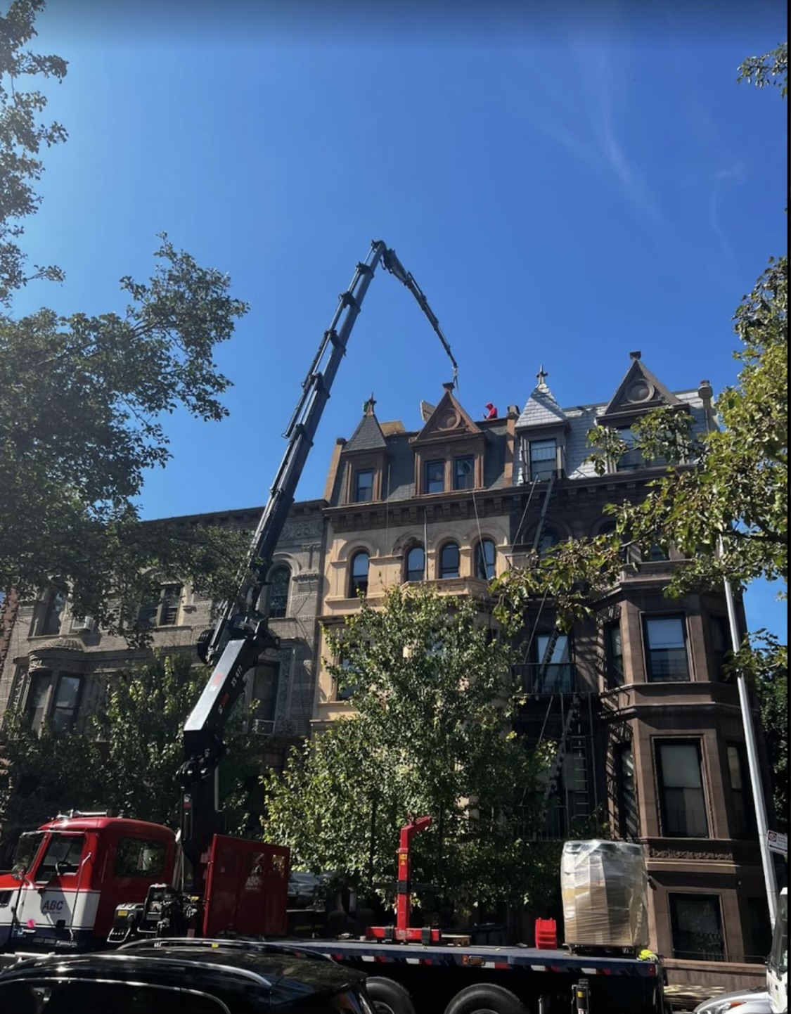 Screenshot A roofing project involving a crane